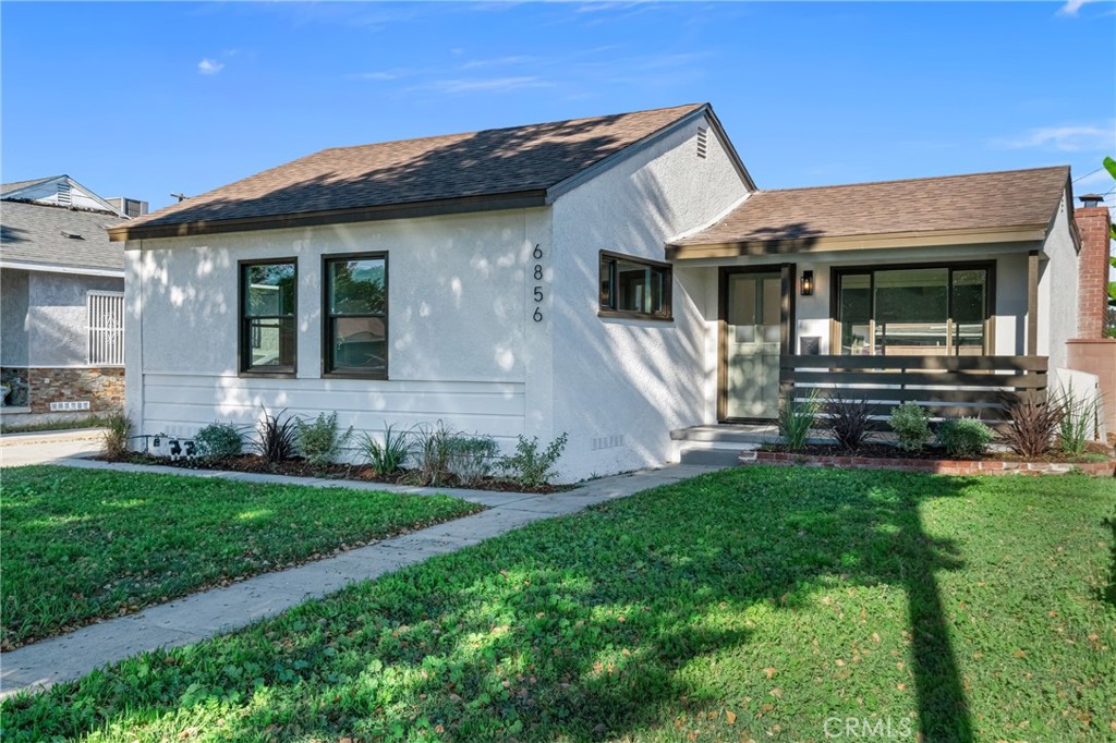 Welcome to 6856 Butler Avenue, a refreshed 2 bed/1 bath, in the beautiful city of Long Beach!
As you pull up to the property you'll notice this home has excellent curb appeal with a welcoming front patio! The front yard is beautifully maintained, with lush green grass and a long walkway leading to the front porch. As you approach the entrance, you’ll see updated landscaping and fresh exterior paint that adds to the home’s curb appeal.
Inside, the entry opens to a bright front living area with recessed lighting before leading into the spacious step-down family room. This step-down family room features white-beamed ceilings, a large brick fireplace framed by built-in shelving, and sliding glass doors that open to the backyard. A generous window looking out to the backyard further brightens the room, creating an airy, open feel. To the left of the entry area, your dining space flows conveniently with the kitchen.
Down the hallway you have two well-sized bedrooms, each with updated flooring and fresh interior paint along with ceiling fans. The full bathroom has been reimagined with new lighting and new vanity area, creating a modern look.
The backyard offers plenty of versatility with open lawn space, additional paved areas, and a 2-car detached garage. The backyard is huge and offers plenty of options to spur your creative thinking! The garage features a large utility room, perfect for additional storage or maybe even a man cave/game room!
Considering the living square footage and lot size, this home is definitely a must see! Schedule your personal showing appointment today!