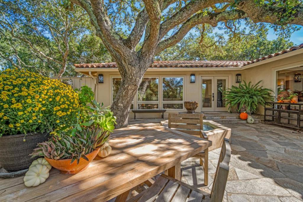 Stunningly updated, single-story home on a private Carmel Valley cul-de-sac. Minutes to Carmel Valley shops/dining, or quick access to Hwy 68 for the airport, Monterey Peninsula beaches, golf, and many other adventures. Ideal for entertaining: gorgeous gourmet kitchen, large open dining with easy flow to extend your dining to the private front patio . At the end of the day, head out to the backyard to your own spa overlooking a serene vista of the sunset, Mt. Toro and Castle Rock. The house features two en-suite bedrooms, half-bath, and versatile 3rd bed/den/office. Additional amenities include solar power and a spacious 3-car garage, approx. 1,000 sq.ft. with heater lights giving you plenty of options for its use. This home is perfect for anyone seeking a comfortable living space in a beautiful setting.