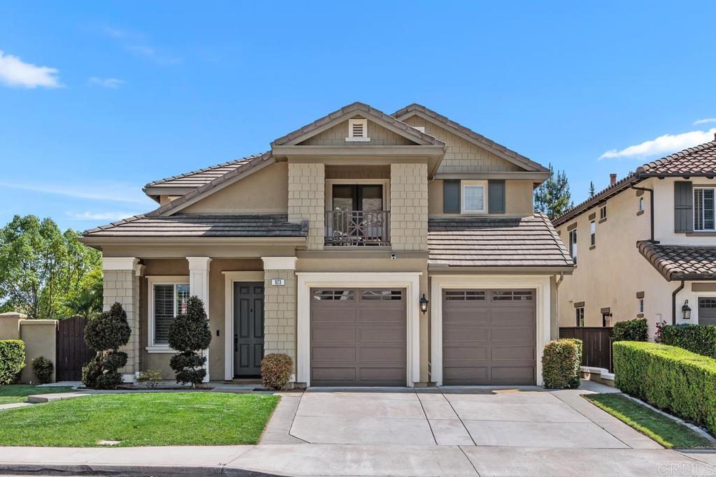 Welcome to this stunning home in the highly desirable community of San Elijo Hills, ideally located on a corner lot in a quiet cul-de-sac. This property offers an open floor plan, abundant natural light, and thoughtful upgrades throughout—including owned solar, two EV changing stations, surround sound, and ceiling fans for year-round comfort. Interior highlights include reclaimed barn wood flooring, newer luxury vinyl plank, crown molding, recessed lighting, and fresh paint. The upgraded kitchen features white cabinetry, granite countertops, a center island, full-height backsplash, stainless steel appliances, and a five burner gas stove—opening to a welcoming family room with a cozy fireplace, perfect for entertaining and relaxing. Upstairs, a spacious loft offers flexible living space. One of the secondary bedrooms includes access to a covered private deck through glass French doors. The large primary suite features a walk-in closet, an upgraded bathroom, a peek ocean view from the bathroom, and a balcony overlooking the backyard and views. The laundry room is conveniently located on the first floor. One of the homes standout features is the versatile bonus room located off the garage, equipped with its own mini split system. Currently used as a music studio, this flexible space is ideal for a home office, gym, art studio, media room or a playroom—offering privacy and unlimited potential. The backyard is designed for entertaining with a built-in BBQ island, custom fire pit, and low maintenance landscaping, along with a drip and sprinkler irrigation system. Additional home features include one central vacuum system with two attachments—one for upstairs and downstairs, a HALO whole-house water filtration system and conditioning system, and a garage with epoxy flooring. Enjoy all the amenities that San Elijo Hills offers—top-rated schools, dog parks, ball field, picnic areas, play grounds, and a scenic 19-acre park—all just minutes from beaches, shopping, dining and freeways.