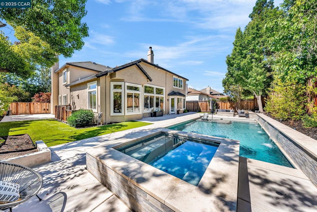 My Preferred lender is offering a rate buydown-helping buyers win in this market! Lower rates mean lower monthly payments — making this dream home more affordable than you think. Welcome to your gorgeous new home in the prestigious Lawrence Estates neighborhood of Danville! This expansive 5-bedroom, 3.5-bath residence offers 3,698 square feet of thoughtfully designed living space, filled with natural light and stylish finishes throughout. The desirable floor plan includes a spacious loft upstairs—ideal for a home office, playroom, or additional lounge area—while the luxurious primary suite is conveniently located on the main level for ultimate comfort and ease. Step outside to a beautifully landscaped backyard retreat, complete with a sparkling pool and plenty of space for outdoor entertaining. Located in one of Danville’s most sought-after communities, this home perfectly blends elegance, functionality, and resort-style living.