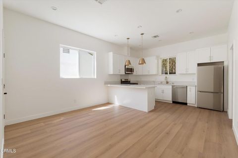 Photo of 10558 Encino Avenue, Granada Hills, CA 91344 (MLS # P1-26854)