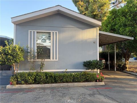 Photo of 41-1461 W Mission Boulevard, Pomona, CA 91766 (MLS # IV26111550)
