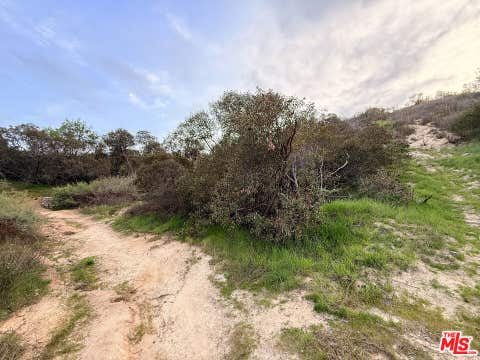Photo of 9745 N Estaban Way Way, Tujunga, CA 91042 (MLS # 26868687)
