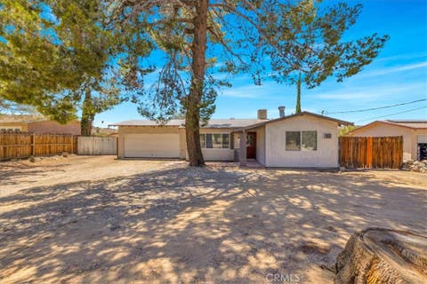 Photo of 7672 Warren Vista Avenue, Yucca Valley, CA 92284 (MLS # JT26151187)