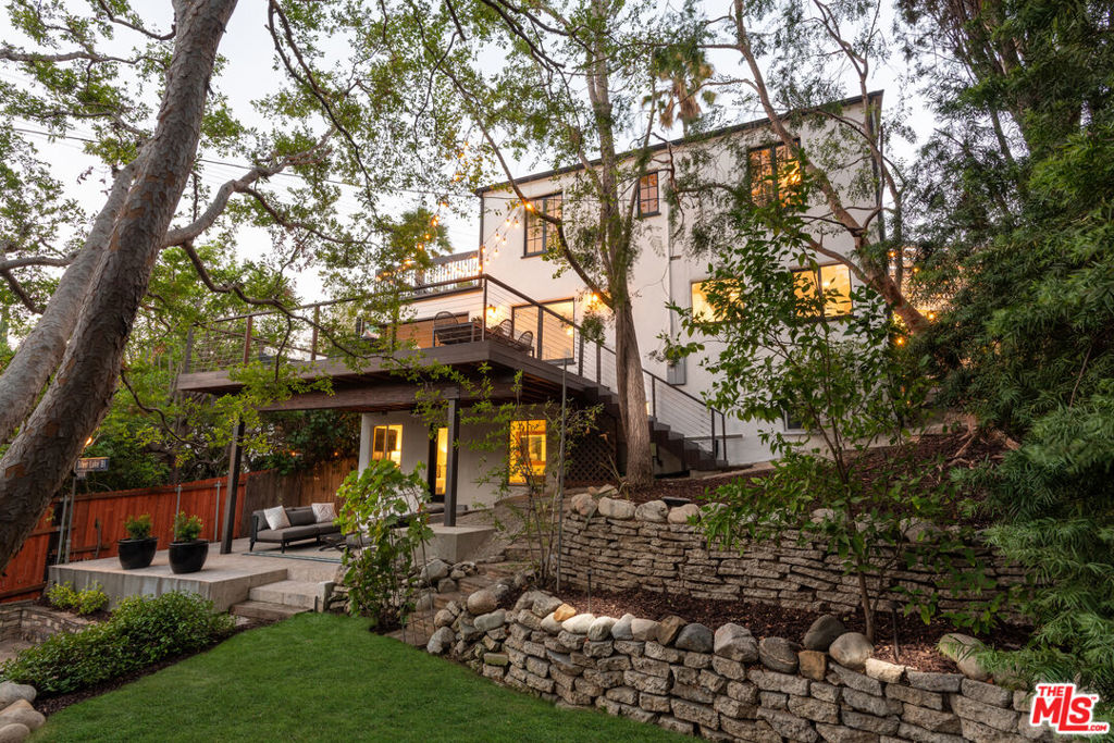 Welcome to 3017 Fall Avenue, a true gem nestled in the heart of Silverlake, where spacious living meets hipster cool. This traditional 3-bedroom, 2.5-bathroom home spans 1,950 square feet, providing just the right blend of comfort and style. Step inside to find gleaming hardwood floors and an airy living area that opens up to a private patio, ideal for morning coffee or evening gatherings. With a deck overlooking the expansive backyard, you'll have the perfect spot for outdoor entertaining or simply soaking in the California sun. Speaking of space, the lot size is a rare find at 7,630 square feet, offering plenty of room for a pool, an accessory dwelling unit (ADU), while still enjoying a large yard to call your own. Mature shade trees provide a serene backdrop, creating an oasis right in your backyard. Embrace the laid-back vibe and make 3017 Fall Avenue your sanctuary in the city. Truly a unique offering.