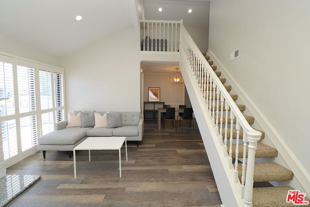 Proudly presenting this superb gem within the wonderful Park Meadows community of Downey. Nestled securely and most primely within a gated condo complex, this modern, remodeled charmer is a highly desirable end unit on the upper floor that offers a bounty of practical and advantageous features. This cozy and charming home comes with high ceilings, a loft for functional space that can potentially be used as a living space, a spacious private balcony, great view, an abundance of natural light, as well as full renovations. Included in the list of upgrades are recessed lighting, kitchen, countertops and cabinetry, bathrooms, flooring, fireplace, and more. The love and care put into this home is reflected in its well-maintained condition. Association amenities include gym, pool, and jacuzzi, while included in the HOA are water, trash, master insurance, and landscaping. There are two assigned parking spots with storage, and also plenty of guest parking. FHA approved and outstanding location of close proximity to various eateries, markets, entertainment and shopping venues, as well as easy access to the 710, 105, and 605 freeways are additional selling points as the cherry-on-top. This is a must-see and a can't-miss.