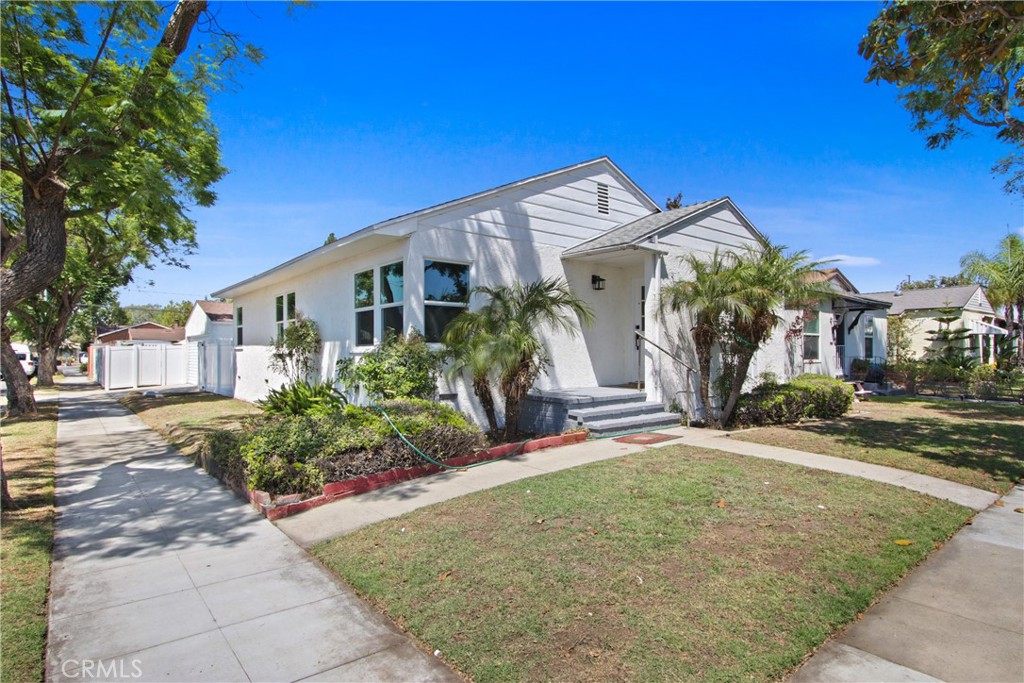 Get ready to be impressed! This fully remodeled 3-bedroom home perfectly blends style and comfort, offering an exceptional living experience.
As you step inside, you'll immediately notice the wide plank flooring that extends throughout, creating a modern and inviting atmosphere. The chef-inspired kitchen is a true highlight, featuring warm-toned cabinetry, stylish wood shelving, crisp white quartz countertops, and brand-new appliances.
This home also boasts the convenience of an indoor laundry room and a versatile detached 2-car garage, ideal for parking, extra storage, or even a future ADU conversion. The large private backyard and patio provides a serene retreat perfect for entertaining, gardening, or simply relaxing in the sun.
Every detail in this home has been thoughtfully upgraded, making it completely move-in ready. All that's missing is you! Don't Miss Out Your New Home Awaits ~