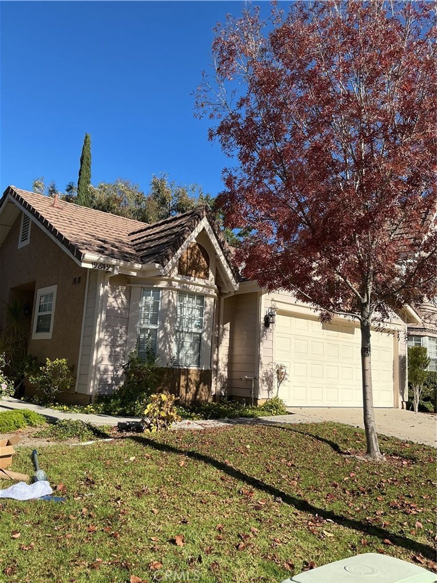 WOW HUNNY STOP THE CAR!!! Beautiful Single Story Home in the desirable American Beauty Classics neighborhood of Canyon Country. As you enter this Stunning Home you will notice the Living room with a fireplace, upgraded mantle, and connecting Dining Room. To the front of the house, is an Upgraded Kitchen with Bay windows and a bench seat that has extra storage in it. The Spacious Primary Bedroom has a connecting Alcove that could be an office, sitting area, or you can put your own special touch. The primary Bath has been upgraded with custom Flooring and a jetted tub. The second Bathroom has been updated with Custom Counter tops, and Tile Flooring. The Tile Flooring was also added to the laundry room as well. There is a sliding door off of the Livingroom that takes you to this Private Backyard Oasis. It has a nice patio area for entertaining for those hot summer nights, a good size back yard with a grassy area, and plenty of fruit trees in the garden. The Rear neighbor's home sits down a bit, which gives some privacy to the Backyard. The amount of Amenities that come with the HOA is Amazing. There are four pools, three tennis courts, a sport court, a small park, and they maintain watering and maintenance of the front yards. This home is close is to Metrolink and the 14 Freeway for an easier commute. And did I mention NO MELLOROOS!