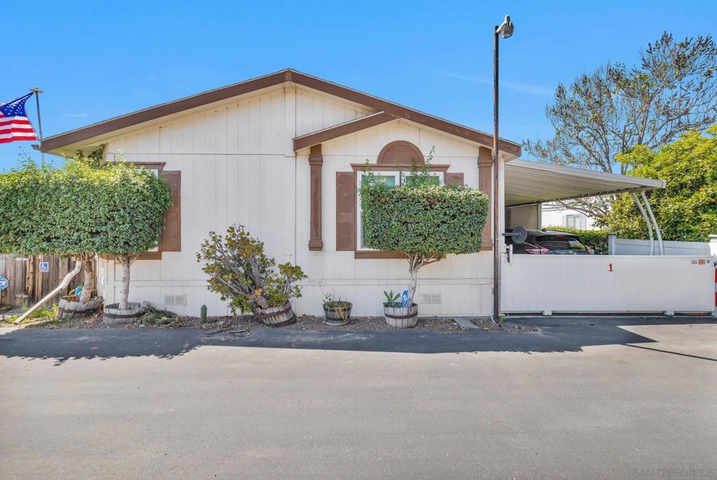 Resident Owned, 55+ Community! The Low monthly assessment is $827 which includes Trash, Sewer, Basic Cable and Internet. Absolutely gorgeous 3 BR, 2 BA home with a split concept floor plan, vaulted ceilings and skylights making it feel spacious and bright. The open living space in the center of the home features bamboo flooring and dual pane windows. There is a newer water heater, dishwasher, AC unit and furnace. Cozy up to the wood burning fireplace in the winter. Beautifully landscaped yard, pride of ownership shown.