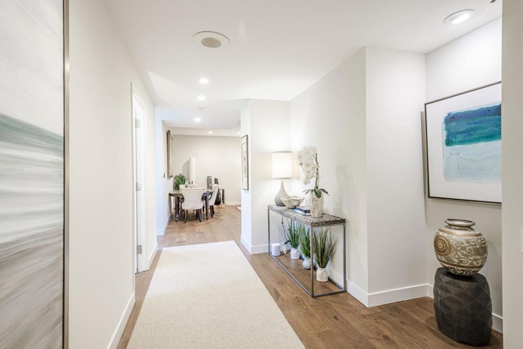 Chic remodeled 2BR/2.5BA unit at the Towers near downtown San Mateo. Custom elements include walnut flooring, designer lighting, high ceilings and walls of windows. An expansive living room opens onto a private patio. The stunning kitchen has Quartzite countertops, wine refrigerator and sleek stainless appliances. Each bedroom is ensuite with beautifully remodeled baths plus ample closet space. Complex includes 24-hour door attendant, gym, pool with spa, sauna, game room, meeting room and sport court. 2 designated parking spaces plus storage room.