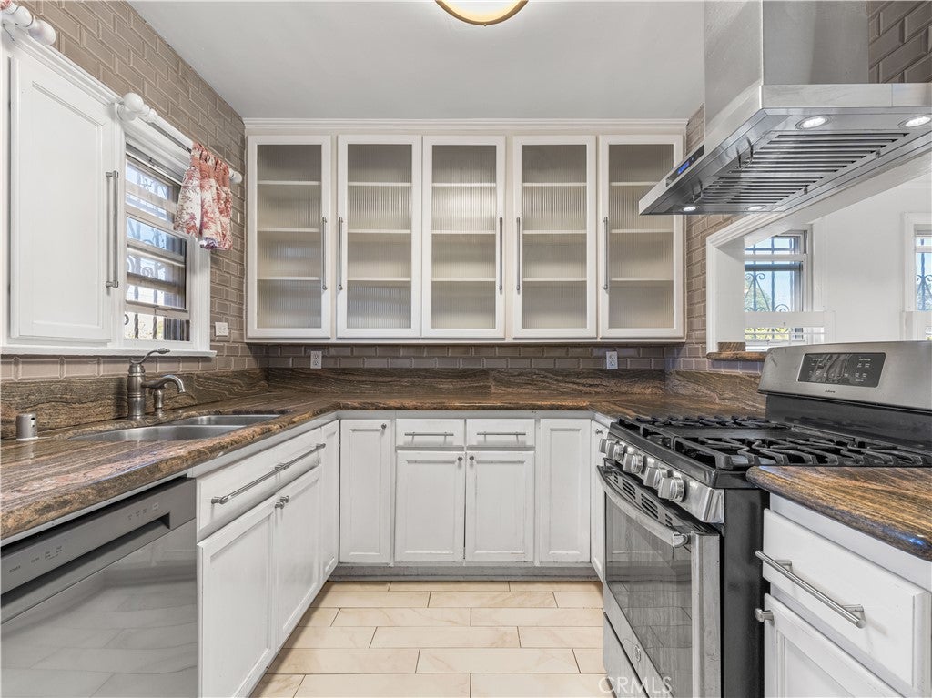 Photo of 2001 W 84th Pl, Los Angeles, CA 90047 (MLS # IV26208576)