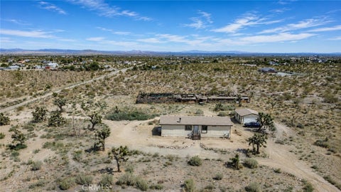 Photo of 1930 Calaveras RD, Pinon Hills, CA 92372 (MLS # IV26175203)