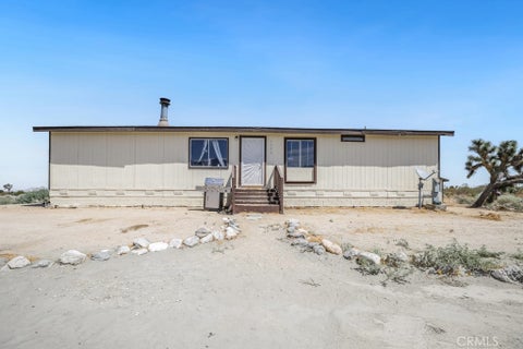 Photo of 1930 Calaveras RD, Pinon Hills, CA 92372 (MLS # IV26175203)