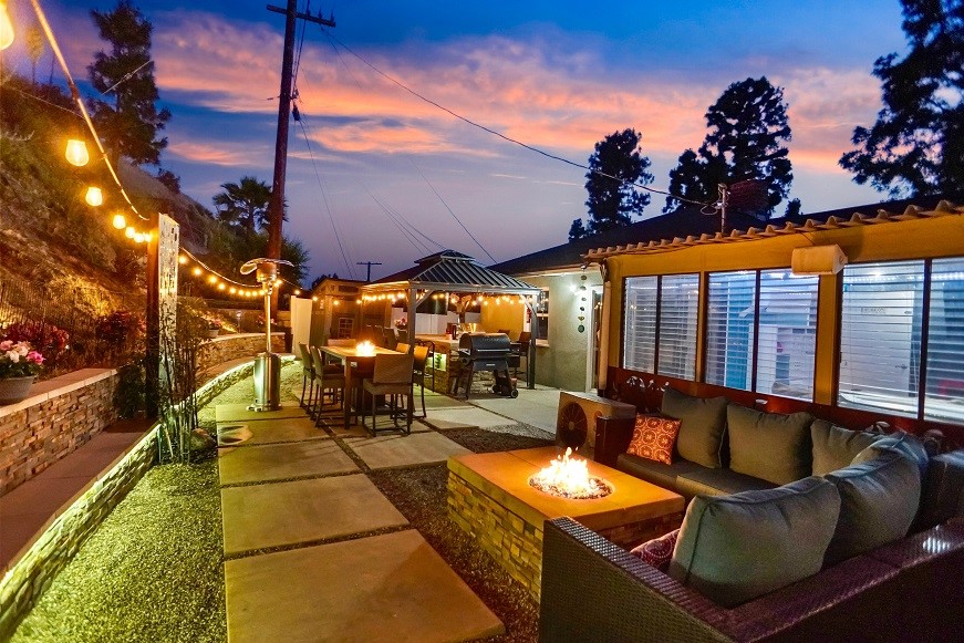 Welcome to this Unique Entertainer’s Paradise in the Glencrest Hills area of Sun Valley! This 3-bedroom, 2-bath mid-century home offers an exceptional blend of original charm, comfort, functionality, and wow-factor outdoor living. Inside, enjoy a well-planned interior layout that provides privacy separating personal living quarters from the main living areas. The bright, open-concept great room combines the dining and living areas, complete with a cozy fireplace. A spacious sunroom which expands the living space, is perfect for a home office, a kid’s playroom, or convertible den. As you move on to the garage you’ll find that it has been adapted to be used for a gym and/or additional dedicated office space — ideal for remote work and personal wellness. This distinctive property features a spectacular backyard renovation showcased on the hit TV show “I Hate My Yard” — and the results are nothing short of extraordinary. Step into a backyard oasis professionally renovated on national TV, featuring: *Built-in BBQ island under a gazebo with a timed misting system; *A surround sound system and accommodations for dual television displays; *Custom fire pit and tranquil waterfall feature; *Built-in single tap Kegerator beer dispenser with refrigeration system. Located on one of the most desirable streets in the Glencrest Hills, this home is a rare blend of timeless style, modern functionality, and exceptional outdoor living just steps away from Burbank, without the Burbank prices. Conveniently located above Glenoaks, minutes away from dining and shopping, and only 6 minutes away from Village Christian School. Don’t miss your chance to own a truly unique property with unforgettable outdoor appeal.