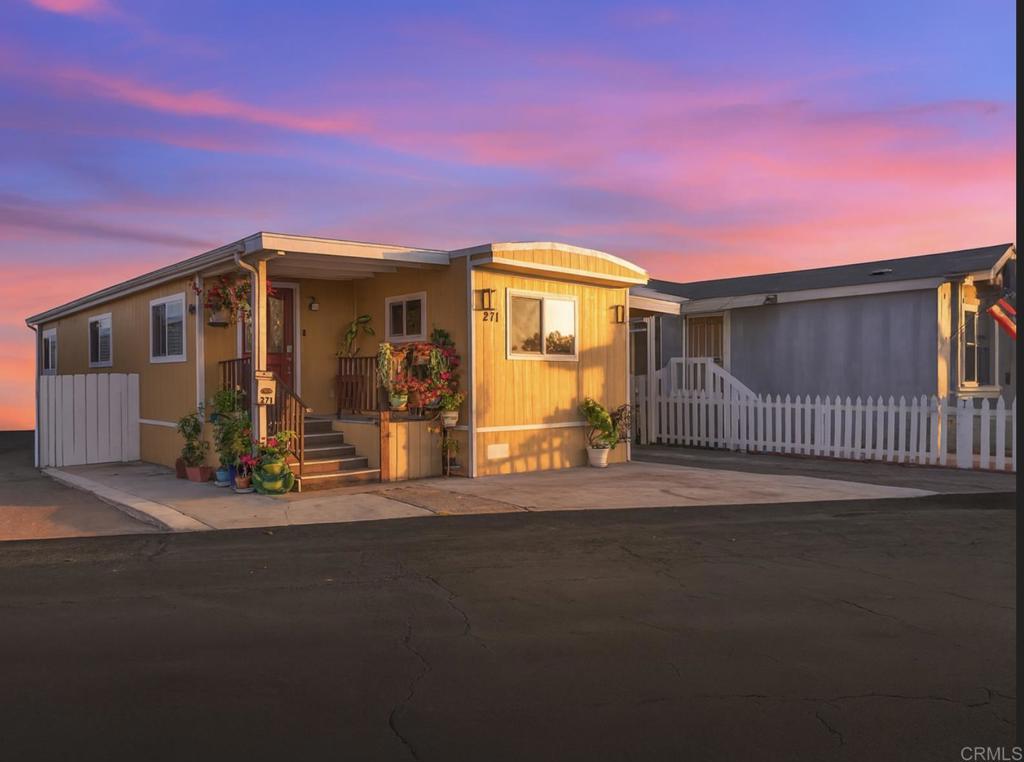 All-Age Family Park! This move-in ready home has been beautifully updated with new dual-pane windows, fresh interior & exterior paint, brand-new flooring, and a completely upgraded plumbing system. Enjoy abundant natural light and an open floor plan that creates a welcoming atmosphere. The covered carport comfortably fits 2–3 vehicles for added convenience. Community amenities include TWO sparkling swimming pools, a clubhouse, and a dog-friendly environment . Plus, benefit from low space rent! Centrally located in the heart of San Diego, close to shopping, dining, and entertainment—everything you need is just minutes away!