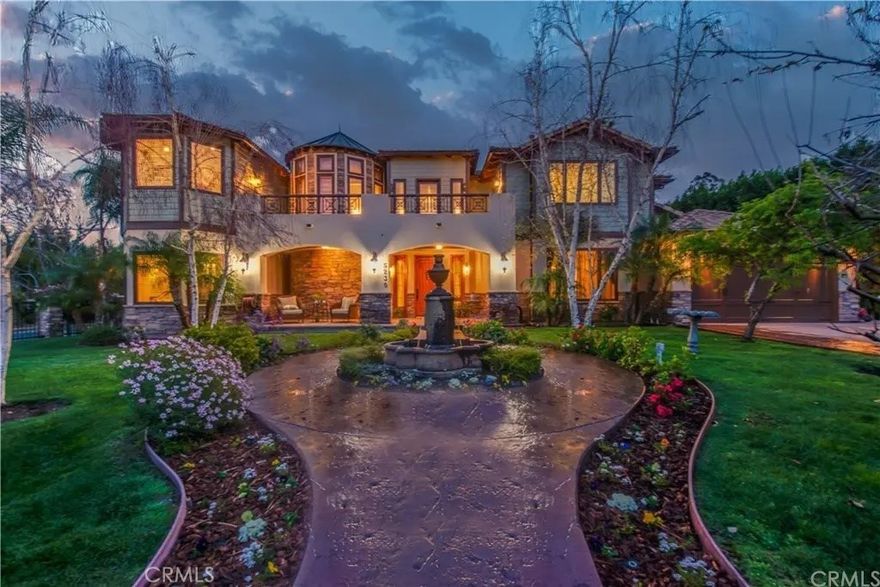 Custom-Built Estate South of Ventura!



This stunning custom-built estate, situated on a prominent corner lot south of Ventura Boulevard, is being offered for the first time. Designed for comfort, style, and entertaining, the residence features 5 bedrooms, 5.5 baths, a private gym, a detached guest house, and approximately 5,567 square feet of living space on a beautifully landscaped 16,945-square-foot lot.



An inviting slate tile entry leads to a formal living room with fireplace and brand-new carpeting, opening to a charming patio with an outdoor fireplace. The chef’s kitchen is a true showpiece, boasting granite and limestone countertops, a Thermador gas range, newer built-in Thermador refrigerator/freezer, KitchenAid warming oven and dishwasher, large island with prep sink, breakfast bar, built-in banquette, butler’s pantry, and desk area. The adjacent family room impresses with soaring two-story wood-beamed ceilings, a dramatic stone fireplace, direct access to the pool area. The formal dining room includes a wine refrigerator and space for large gatherings.



Newly sanded and stained wood floors enhance the home’s refined design. The first level includes a bedroom with ensuite bath, gym, laundry room, mudroom, and powder bath. Upstairs, the expansive primary suite features vaulted wood ceilings, dual walk-in closets, and a private balcony with a spiral staircase leading to the backyard. The luxurious primary bath offers a spa tub, fireplace, separate shower, dual sinks, and sauna. Three additional bedrooms upstairs include walk-in closets—one with a loft—and ensuite or Jack-and-Jill baths with dual sinks and a spa tub. A cozy sitting area opens to a front balcony, and a second laundry room.



The detached 552-square-foot guest house includes slate tile flooring, a full bath, wall AC/heat unit, and plumbing for a kitchen, with direct access to the pool area.



The backyard is a resort-style retreat featuring a Pebble Tec heated pool with gradual entry, spa, waterslide, two waterfalls, outdoor kitchen with built-in BBQ, vegetable garden, and storage shed. Mature trees provide exceptional privacy, and the property is secured by two electric gates. Ample parking includes a four-car garage and RV access.



This estate combines timeless craftsmanship with modern luxury in one of the Valley’s most desirable locations—an entertainer’s paradise with every amenity imaginable. RPO open to sober living or group home.  Coolest house in the Valley, by far!