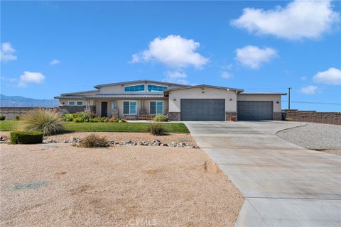 Photo of 9944 Seven Palms Drive, Oak Hills, CA 92344 (MLS # HD26225704)