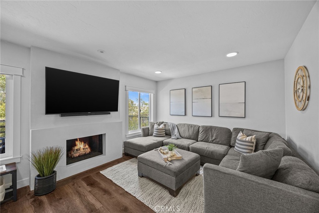 Located on a premium cul-de-sac lot in the heart of Monarch Beach, this beautifully upgraded 3-bedroom, 2.5-bath townhome offers over $100,000 in recent renovations and no detail has been overlooked. Perched above a greenbelt with sweeping city lights and ocean views, this rare end-unit feels like a private retreat.
Step inside to find a thoughtfully customized interior, beginning with a show-stopping staircase featuring designer railings and warm wood treads. The open-concept first floor includes a light-filled living room with an upgraded deck, a spacious dining area, and a fully remodeled kitchen featuring stone countertops, glass tile backsplash, and stainless-steel appliances.
Upstairs, the primary suite boasts a vaulted ceiling, a spa-like ensuite with dual sink vanity, designer farmhouse closet doors, and a private ocean-view deck. The suite also features attic access via a convenient dropdown ladder. Two additional bedrooms open to another private deck and share a full bath with breathtaking ocean views.
Notable Upgrades & Features:
- New decking & roof
-Solar panel system and EV charging port
-Recently replaced HVAC system
-Fully updated two-car garage
-Large skylight for abundant natural light
-Located on a greenbelt offering the feel of a private yard
Enjoy resort-style amenities including a community pool, spa, and clubhouse. HOA covers water and trash for added convenience.