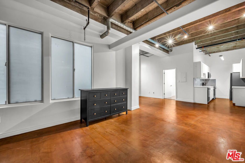 Airy, loft-style apartment for lease in the heart of Downtown LA! Located in a beautiful historic building close to Pershing Square Park and the Pershing Square metro station, this fourth floor apartment boasts a newly renovated kitchen with brand new cabinetry and appliances, including a dishwasher, electric stove, refrigerator, and microwave. Enjoy the convenience of an en-suite washer/dryer and an inviting outdoor patio overlooking an interior courtyard. Additional amenities include central AC as well as 24-hr security front desk concierge, fitness room, rooftop pool, hot tub and rooftop lounge area with panoramic views of the Downtown Los Angeles skyline. No parking included; valet parking available on site for an additional charge. Don't let this DTLA gem pass you by!
