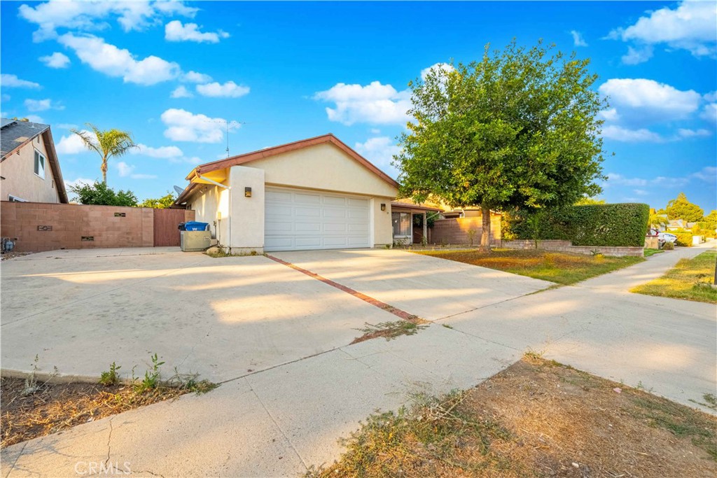 This beautifully maintained single-story home features 4 bedrooms and 2 bathrooms, offering both comfort and style in a quiet neighborhood. The inviting layout includes a bright, open kitchen that flows seamlessly into the dining area and family room, perfect for everyday living and entertaining. The master suite boasts its own private bath, while the additional bedrooms provide flexibility for family, guests, or a home office. The home comes complete with a refrigerator, washer, and dryer for added convenience. A two-car garage is complemented by dedicated RV or boat parking, providing ample space for all your needs. The large backyard with a covered patio is ideal for relaxing or hosting gatherings, and the property does not back up to the train tracks, ensuring privacy and peace. Well-kept and full of charm, this home is ready for you to move in and enjoy.