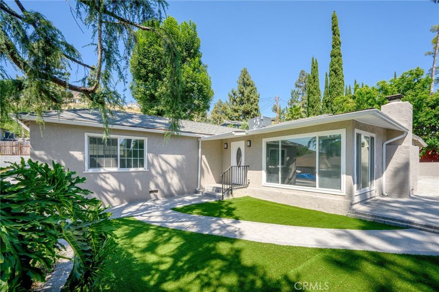 Main house * part of 2-unit complex on 12,368 sq ft lot  * completely remodeled * 3 bed/ 2 ba * 1,332 sq ft * 2 car parking (possible room for 3rd) * all appliances included * Central AC & Heat * decorative fireplace * intercom system * separate laundry room * kitchen peninsula * recessed lighting * vinyl waterproof floors * lots of front and back outdoor space * mature grapefruit and lemon trees * large driveway area * gated entry into the property * blue-ribbon school district * tenant pays all utilities  - water split 3/4 & 1/4 with studio unit