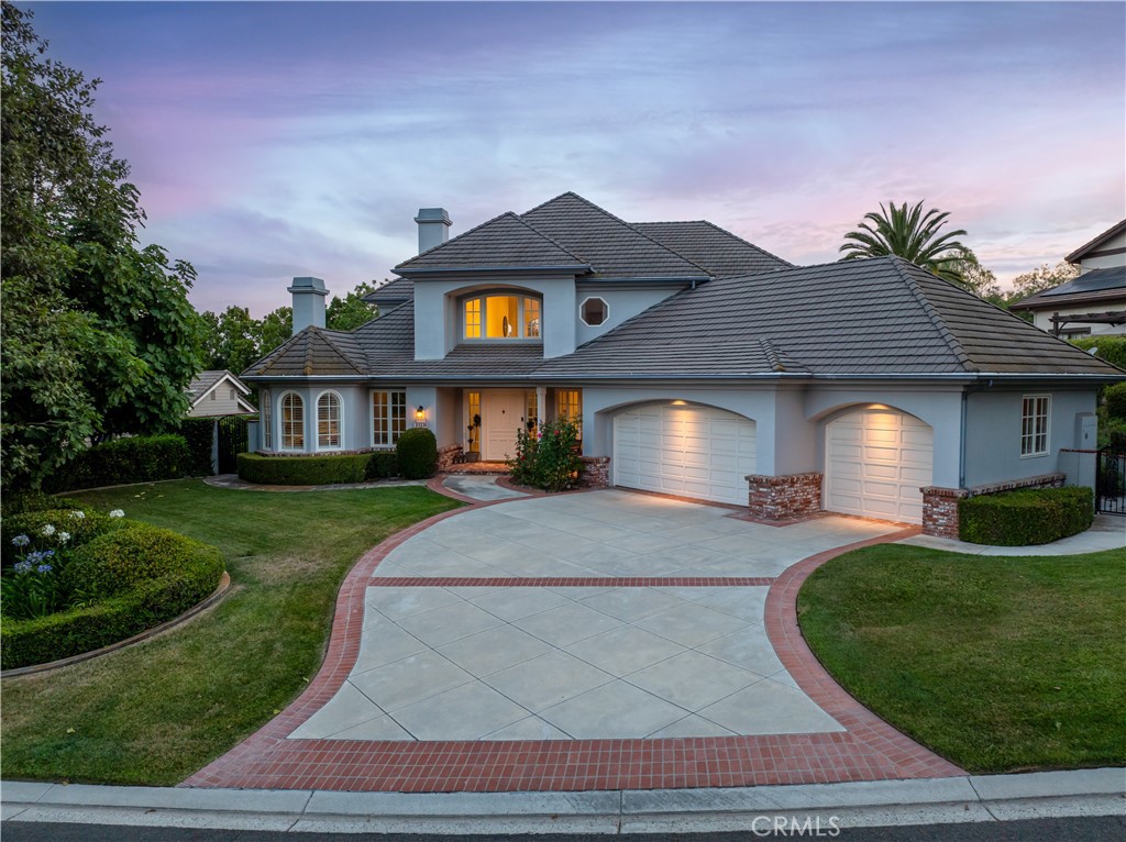 Welcome to this stunning 5 bedroom 5 bathroom custom estate located in the prestigious gated community of Coto de Caza, nestled on a private 18,000 square foot cul-de-sac lot in the highly sought-after Lower Rancho Colinas neighborhood. Spanning nearly 5,000 square feet of living space, this beautifully upgraded home entry, formal foyer with sweeping staircase and picturesque windows, formal living and dining rooms, and a brick wine cellar. The kitchen includes all new appliances including double ovens and a built-in refrigerator and overlooks a spacious step down family room with fireplace, custom built-ins, and garden views. The rare downstairs primary suite offers a cozy fireplace, dual walk-in closets, and a spacious bath, while a separate downstairs office with its own fireplace, built-ins, full bath, and patio access is perfect for work or guests. Upstairs includes three generously sized bedrooms with balconies and an oversized bonus room that could easily convert to one or two additional bedrooms. Recent upgrades include refinished wood flooring, fresh interior paint, a new HVAC system, and electric window shades. The backyard is a private oasis complete with a saltwater pool and spa with rock waterfall, gas firepit, covered patio, built-in BBQ, pizza oven, and beautifully landscaped grounds with space to expand. An attached three car garage with built-in storage completes the home, all conveniently located near hiking trails, golf courses, and top-rated schools.