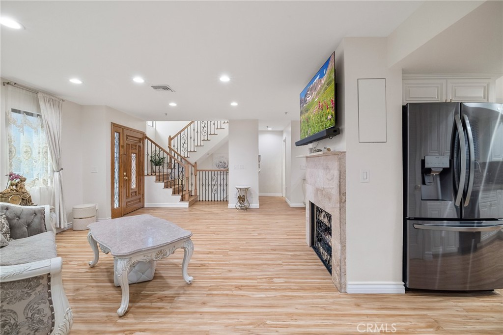 Welcome home to this RARE luxury townhouse with a PRIVATE 2-car garage and over $80,000 in upgrades, featuring a fully renovated kitchen, updated bathrooms, new flooring, and custom finishes throughout. Perfectly situated on one of Northwest Glendale’s most desirable streets, this 3-bedroom, 3-bathroom residence offers 1,600 sqft of thoughtfully designed living space with no neighbors above or below, creating a rare sense of privacy and comfort. The well-maintained and quiet 12-unit complex offers low HOA fees, while this home boasts its own PRIVATE 2-car garage with direct access, in-unit laundry, and modern conveniences such as an EV charger hookup and an Aquasana whole-house water filtration system. Enjoy a PRIVATE patio which is also a rare find in most townhomes. Inside, the bright and airy layout features a spacious living room, defined dining area, and stylishly updated kitchen, blending everyday functionality with modern design. With each level thoughtfully separated for flexibility and privacy, the home is ideal for families, professionals, or anyone seeking a peaceful retreat in the heart of the city. Enjoy close proximity to top-rated schools, local parks, and Glendale’s premier shopping and dining, including The Americana at Brand and Kenneth Village.
