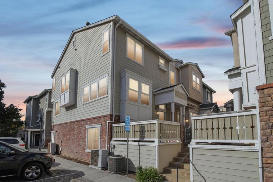 Beautiful east-facing craftsman-style end-unit townhome in a prime Cupertino location with top-rated Cupertino schools! Built in 2010, this 1,762 SqFt home offers 4 bedrooms and 2.5 baths with an inviting open floor plan. The elegant living room features soaring ceilings, picture windows, gleaming wood floors, and decorative tile stairs. The open family/dining area provides the perfect space for entertaining and relaxation. The gourmet kitchen includes granite countertops, stainless steel appliances, abundant cabinetry, recessed lighting, and a cozy dining area. A main-level half bath is ideal for guests, and the lower-level bedroom is perfect for multi-generational living. Upstairs features a spacious primary suite with dual sinks and large shower, plus two additional bedrooms and a full bath. Finished 2-car garage, new interior paint, updated lighting fixtures, and convenient access to Apple Park, Main Street Cupertino, and parks!