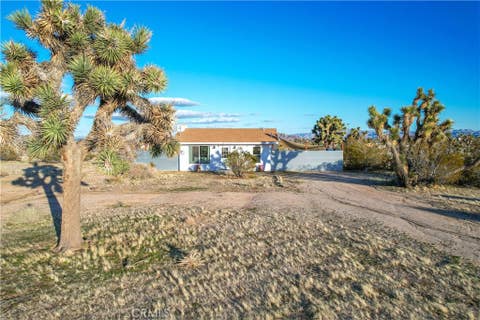 Photo of 3567 Condalia Avenue, Yucca Valley, CA 92284 (MLS # JT26175798)