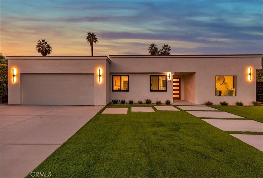 Experience modern luxury in this fully reimagined single-story home in the desirable Tahquitz River Estates. Situated on a generous 9,583 sq ft flat lot, this 4-bed, 3-bath, 2,554 sq ft residence was taken down to the studs, reconfigured with an open-concept layout, and rebuilt with full City permits, including all-new plumbing, electrical, insulation, drywall, HVAC, roof, windows, doors, flooring, fixtures, appliances, hardscaping, and landscaping.

A sleek modern entry leads into an expansive living and dining area with oversized sliders showcasing stunning mountain views and true indoor/outdoor flow. The showpiece chef’s kitchen features a massive waterfall island, custom cabinetry, premium quartzite slab counters, full slab backsplash, stainless steel appliances, double ovens, a 6-burner range, wine/beverage storage, and designer lighting.

The primary suite is a private retreat with vaulted ceilings, a modern fireplace, picture-window views, a walk-in closet, and a spa-caliber bathroom with an oversized glass shower, dual rainheads, skylight, floating vanity, and premium tilework. Three additional bedrooms offer exceptional versatility, including two en-suite rooms perfect for guests, multigenerational living, or home office needs. All bathrooms feature frameless glass showers, LED-lit mirrors, and floating vanities.

The backyard delivers the ultimate Palm Springs resort experience with a newly renovated inground pool & spa, expansive patios, modern hardscaping, privacy walls, mature palms, and unobstructed desert hill and mountain vista views; ideal for entertaining or peaceful sunset evenings.

Located in the coveted Tahquitz River Estates, this home offers quiet streets, lush palms, and unbeatable proximity to downtown. Just minutes from world-class dining, boutique shopping, art galleries, spa resorts, golf, and scenic hiking trails, the location blends serenity with convenience. Whether you seek a full-time residence, a weekend sanctuary, or a high-performing vacation rental, this property delivers the luxury and lifestyle buyers want.

Move-in ready, fully renovated, and impeccably designed. Tour this exceptional Palm Springs retreat today.