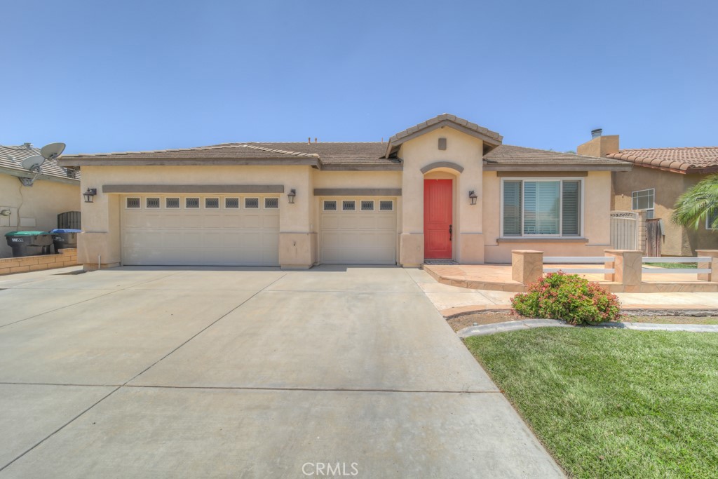 Welcome home to this spacious 3 bedroom, 2 bath, 2119 sq feet, single story home with a 3 car garage located in Menifee, with no Home Owners Association! As you walk into the home, the formal living and dining room are on the right. Next is the kitchen to the right. There is a large island with cabinets and seating, storage galore, walk in pantry and built in desk. All open to the eat in kitchen area and family room. The primary bedroom is big with sliding doors to the real grass landscaped back yard and covered patio with a ceiling fan. Back inside the primary bathroom has shower, bathtub and double sinks. The walk in closet seems endless! The two secondary bedrooms are a good size and the secondary bathroom has dual sinks. The indoor laundry has a deep sink. This house has been very well maintained. Come check it out, you won't be disappointed!