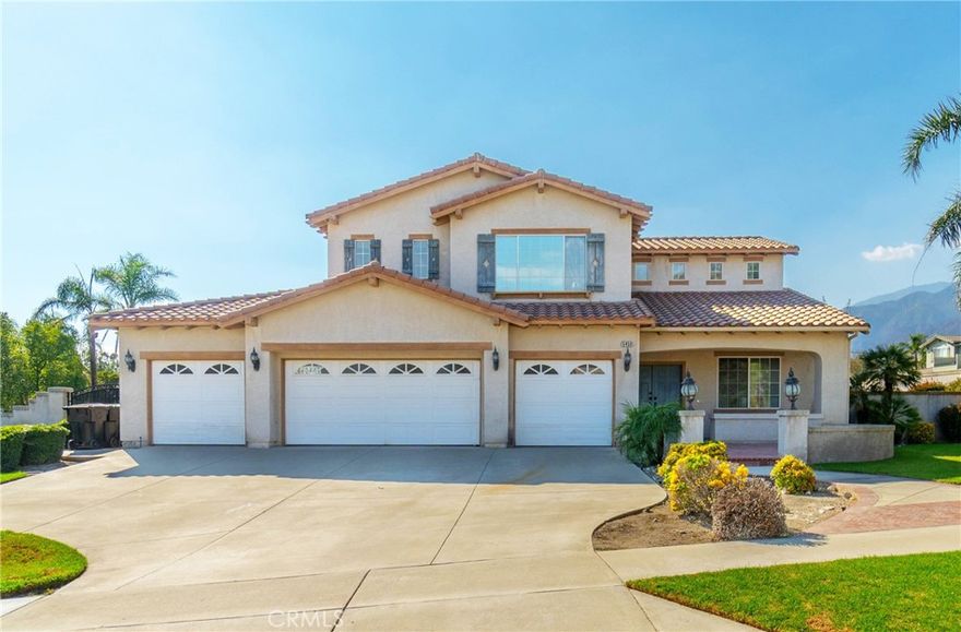 LOCATION LOCATION LOCATION! Prime cul-de-sac lot. *VIEWS OF THE CITY LIGHTS AND LOCAL MAJESTIC MOUNTAINS. 4 car finished garage. *1 BEDROOM DOWNSTAIRS. Potential RV parking. Intricate brick inlay front hardscape walkway leads to the covered front porch and double door entry. Soaring cathedral ceilings greet you upon entry. The formal living and dining rooms are exquisite, and spacious enough for entertaining many guests or your largest dining occasions. Open chef's kitchen boasts lots of counter and cabinet space, and has an island breakfast bar and separate dining nook. The giant family room is off the kitchen and has a fireplace with plenty of space for your largest entertainment center. It also has access to the backyard and covered patio area. There is 1 bedroom down and 3 up. The 4th bedroom is currently used as a den. The primary bedroom, which is massive, boasts a SPRAWLING WALK-IN CLOSET and elegant bathing quarters with separate shower and relaxing soaking tub. The beautiful city lights and mountain views from its private balcony are breathtaking! It's retreat area (5th bedroom option) is perfect for a gym, library, or nursery. The professionally designed backyard, complete with block wall privacy, features a sparkling pool and spa, covered patio, and breathtaking mountain views. AWARD WINNING SCHOOLS, world class shopping and dining opportunities, and abundant park and recreation facilities are all nearby. This is your perfect opportunity to make this property your HOME SWEET HOME.