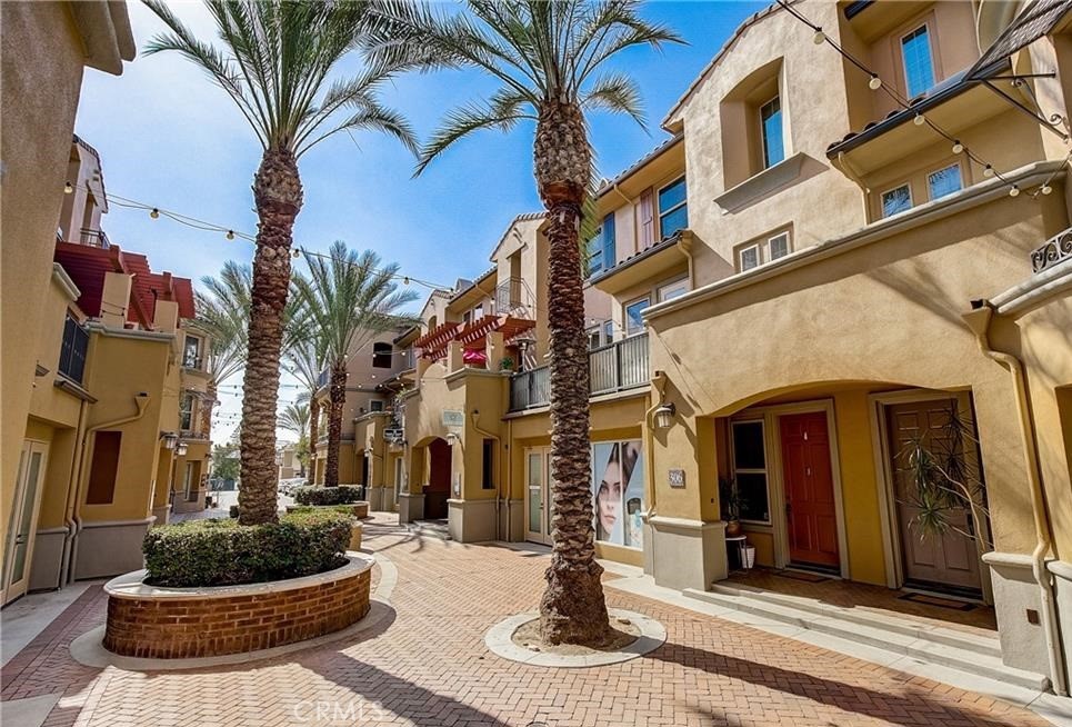 Beautifully Updated 3-Bedroom, 3-Bathroom Townhome in the Highly Desirable SOCO Walk Community
Experience urban living at its finest in the heart of Downtown Fullerton! This spacious tri-level townhome offers a perfect blend of comfort, style, and convenience.
The entry level provides direct access to a two-car garage for added ease and security. On the main level, enjoy an open-concept layout combining the living, dining, and kitchen areas—ideal for entertaining. This level also includes a bedroom and full bathroom, perfect for guests or a home office.
Stylish walnut-colored flooring, a cozy gas fireplace, and a private balcony create a warm and inviting atmosphere. The kitchen features white cabinetry with glass-front accents, granite countertops, and recessed lighting for a bright and elegant touch.
Recent upgrades include brand-new interior paint and new carpet on the stairs and in all bedrooms. Upstairs, you’ll find two spacious master suites, each with high ceilings, en-suite bathrooms, and ample closet space. A convenient indoor laundry closet completes the upper level.
Located steps away from the Fullerton Amtrak and Metrolink stations, SOCO Walk residents enjoy easy access to top-rated restaurants, trendy coffee shops, and local entertainment—offering the best of downtown living in a vibrant community.