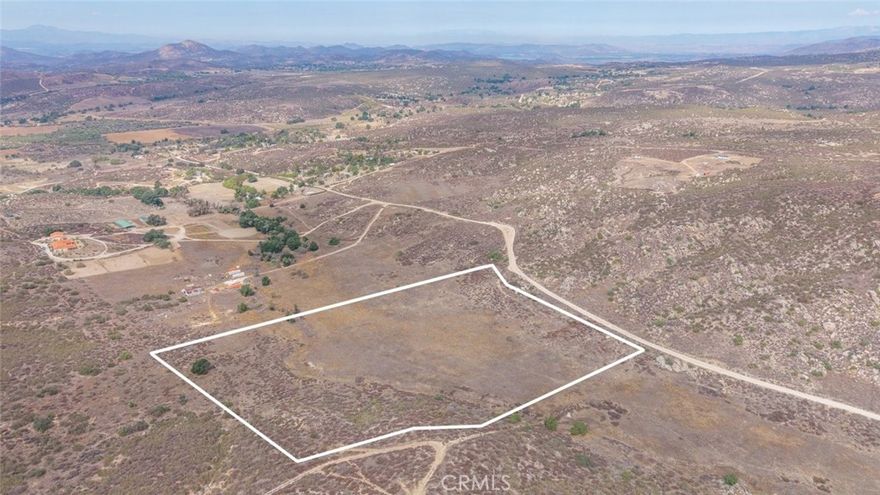 IF you are seeking privacy and separation from neighbors with space for your custom home and ranch, horse training ranch, boarding ranch or compound, take a look!  Nearly flat and almost 19 acres of very gentle rolling land with a well located at the Southeast corner of Ardia Road and E. Benton Rd.  The neighbors are at a distance and there is room for a family compound, a horse training facility, or your own ranch.  It's quiet and peaceful and you can use your creative side to determine your best use for the property.  Electric available at road.  Outlines in the photos are the approximate boundaries of the lot.  Buyer to verify all.