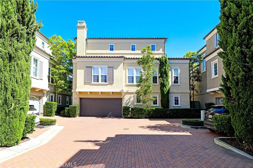 Lovely Verona 3 bedroom, 3 bath detached home featuring 1 bedroom and 1 full bath on the ground level.  Wood, stone and carpet flooring.  Granite counters and stainless steel appliances in kitchen.  Stone counters and floors in baths.  Nice stone patio.  Conveniently located adjacent to Newport Coast shopping center.