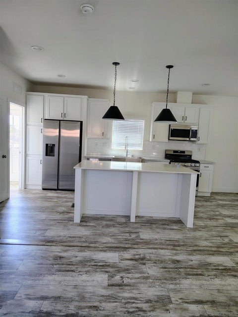 Photo of 9441 Domer Rd, Santee, CA 92071 (MLS # 260022462SD)