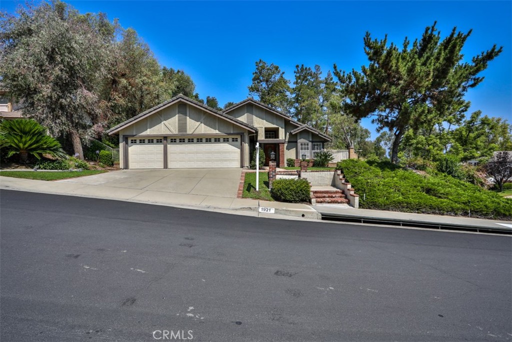 Single-Story Home in Via Verde Ridge – Private Corner Lot with Mountain & Foothill Views. Welcome to this beautifully upgraded single-story home located in the highly sought-after Via Verde Ridge development of San Dimas. Set on a secluded corner lot with no neighbors behind, this home offers ultimate privacy and stunning views of the surrounding mountains and foothills. Inside, you’ll find an open and elegant layout with natural slate tile flooring throughout, plantation shutters, recessed lighting, and a warm, cozy fireplace perfect for relaxing evenings. There is an additional room that could be a 4th bedroom/office/den. The upgraded kitchen features high-end Monogram stainless steel appliances, modern pendant lighting, and stylish cabinetry—ideal for both cooking and entertaining. At the rear of the home, a custom-built bar creates the perfect space for entertaining guests or unwinding in your own private retreat. Both bathrooms have been tastefully remodeled with quality finishes, adding to the home’s upscale feel. Additional highlights include a spacious three-car garage, abundant natural light, and located in the highly rated South Hills High School district. With parks, golf, shopping, and freeway access just minutes away, this property delivers comfort, convenience, and class in one of San Dimas’ premier neighborhoods.