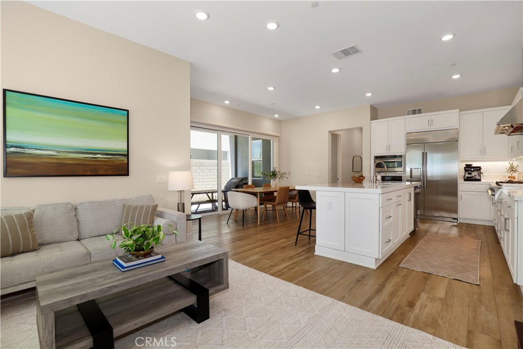 Welcome to this beautiful 4-bedroom, 4-bathroom home located in the heart of Valencia’s highly desirable Five Point community. Built in 2021, this modern residence offers the perfect blend of style, comfort, and functionality.
Step inside to discover a bright, airy interior filled with an abundance of natural light. Spacious bedrooms provide plenty of living space for the whole family including a convenient first-floor suite, ideal for guests, a home office, or multi-generational living. Upstairs, a large multipurpose family room offers flexibility as a media room, play area, or additional living space to suit your lifestyle.
Enjoy exceptional outdoor living with several oversized balconies perfect for relaxing, entertaining, or soaking up the sunshine. The expansive garage provides ample parking and includes additional space ideal for a home gym, workshop, or extra storage.
As part of the master-planned FivePoint community, you’ll enjoy beautifully maintained surroundings, thoughtfully designed spaces, and access to top-rated schools. This home is also just minutes from shopping centers, freeways, and a wide variety of popular eateries offering comfort, convenience, and connection all in one place.