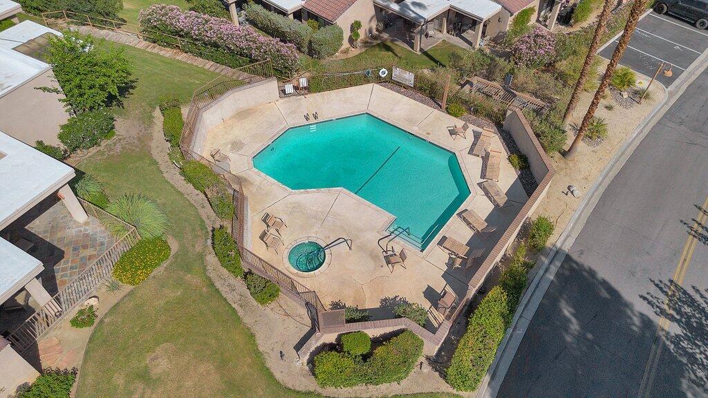 Views, privacy and peace and quiet...that's what you will get at this wonderful 2 bedroom, 2 bath condo that is located in S. Palm Desert. The location is spectacular! You're right at the base of Cat Creek. There are 4 outside living spaces for you to enjoy and if you like hiking, there are many trails nearby. The windows and sliding doors were replace with energy efficient dual pane glass (2017). Plantation shutters open to your private patios that overlook the gorgeous foothills and city below. At night, the stars will twinkle to your delight. There is a community pool and spa to enjoy and pickleball or tennis courts. Come take a look at your winter get-a-way or you primary home! This condo is waiting for you to make it your own!!