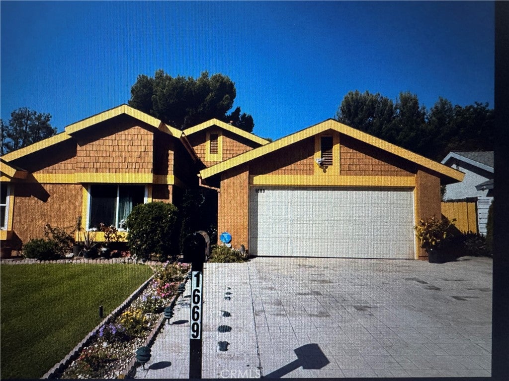 Photo of 1669 W Phillips Drive, Pomona, CA 91766 (MLS # TR26157535)