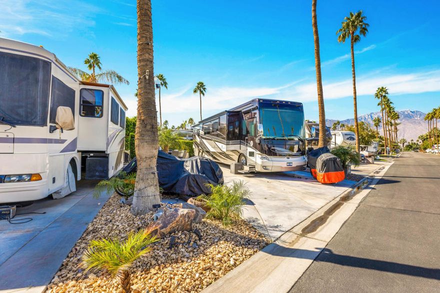 Discover a private oasis in the heart of ORPS on this beautiful interior lot. Perfectly situated so that there is minimal afternoon sun on the patio! Conveniently, situated between Satellite B and C, and with easy access to the resort entry/exit, this property offers the perfect blend of tranquility and convenience. Mature Ficus trees envelop the lot, creating a serene and secluded escape from the everyday. Enhancing the outdoor living experience is a built-in outdoor kitchen and BBQ, perfect for entertaining friends and family in the idyllic desert climate. Also included is a large wrought iron,mosaic tile topped, dining table with 8 chairs &amp; cushions, and a deck box. Outdoor Resorts Palm Springs is a Five Star RV Resort Community combining luxury with affordability. It is a guard gated resort that sits on 137 beautifully landscaped acres with 27 holes of executive golf, 10 tennis courts,13 pickleball courts, 8 swimming pools, a fully equipped fitness center, sports bar, beauty salon/barber shop, full-service restaurant, 2 club houses, activities, special events and so much more.All offers considered!