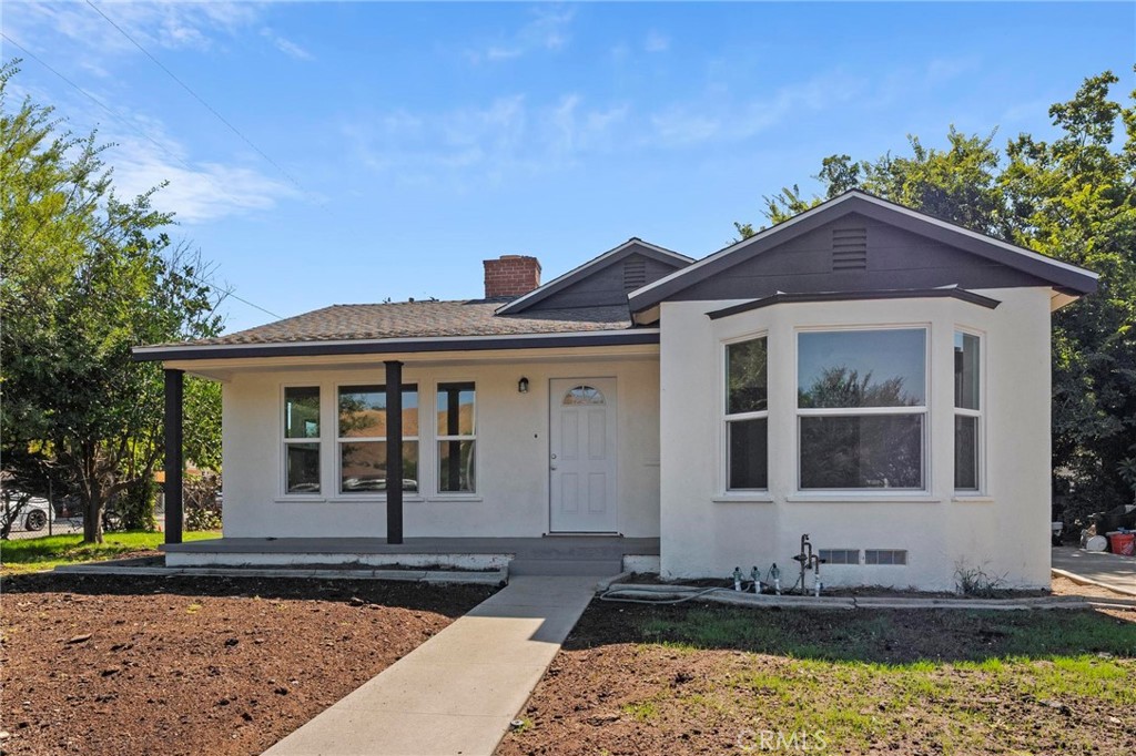 Welcome to this beautifully renovated 3-bedroom, 2-bathroom home situated on a spacious 8,000+ square foot lot in San Bernardino. As you step inside, you’ll be greeted by brand-new flooring that flows seamlessly throughout. The kitchen has been upgraded with new stainless steel appliances, stunning new countertops, and includes plenty of storage for all of your culinary needs. Both bathrooms have been remodeled, including new flooring, new vanities, and elegant new tile in the showers. Recessed lighting has also been installed throughout the home, creating a bright, inviting atmosphere. Outside, you'll find a spacious backyard with endless possibilities, perfect for outdoor gatherings or relaxing in the California sun. The detached garage provides additional storage and parking space, adding even more convenience to this already exceptional home. Whether you're hosting friends or enjoying quiet evenings at home, this renovated gem in San Bernardino offers the perfect space to call your own.