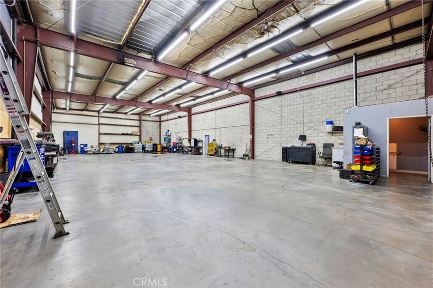 A rare opportunity for business owners and investors, this commercial warehouse offering spans 5,944 sq. ft. across two separate parcels, sold together. Please note: pricing is listed per parcel and is not combined. The property features a fully fenced storage yard with ample space for semi-trucks, work vehicles, and heavy equipment. Ideal for logistics, fleet operations, construction, or auto-related businesses, it offers versatile warehouse space that can be adapted for service bays, equipment storage, or inventory management. The secure yard is designed for high-volume operations, ensuring safe and efficient access. Located in San Bernardino with close proximity to major freeways and key transportation corridors, this asset sits in one of Southern California’s fastest-growing industrial hub!