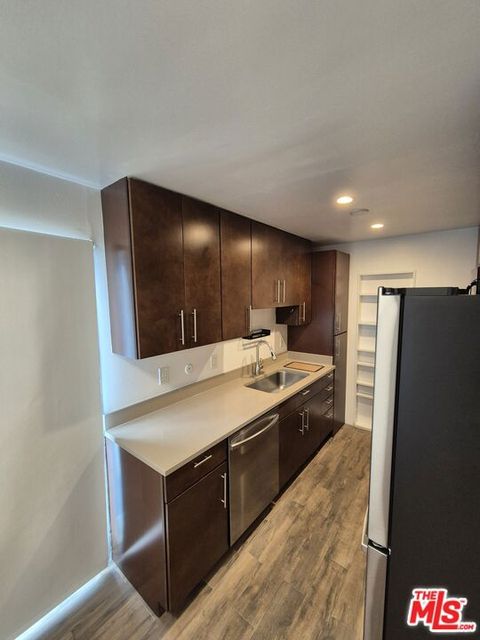 Photo of 3734 S Canfield Avenue #228, Los Angeles, CA 90034 (MLS # 25576755)