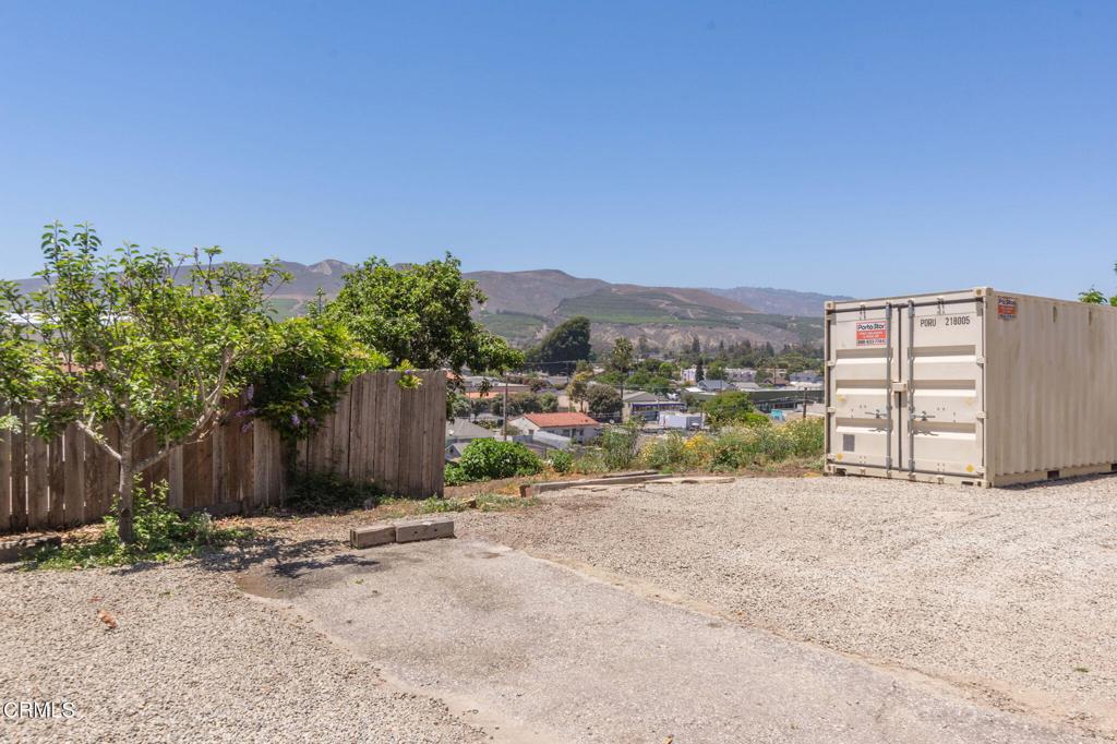 Property was previously offered for sale in combination with 253 Cedar. Sellers have decided to offer property for Sale separately.This lot is rare and highly desirable for development in West Ventura where Poli Street turns into Cedar Street. The 9,147 sq ft. vacant lot is zoned within the Downtown Specific Plan offering flexibility and potential for new construction that encourages thoughtful growth and urban integration. This is an exceptional opportunity for an individual, investor or developer to build a single-family or multi-family home within walking distance of the historic downtown, the beach, and cultural amenities. The lot is on a hillside that goes down to Wall Street. Enjoy breathtaking sunset views over the Pacific and up the valley to the mountains of Ojai. Unlock the potential of this stunning location in one of Ventura's most sought-after and evolving neighborhoods.