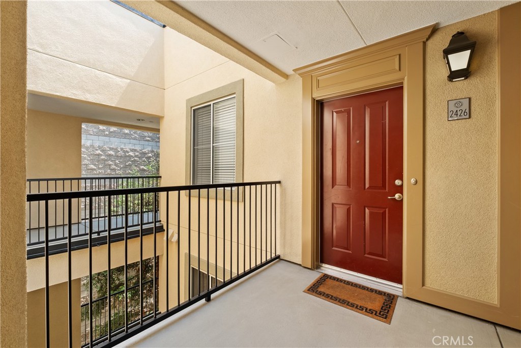 Welcome to 2426 Westmarke Place—a wonderful, resort-style community in Irvine offering an abundance of amenities, including concierge services, a clubhouse, business center, state-of-the-art fitness center, pool, cabanas, spa, basketball and tennis courts, a multimedia movie room, and a peaceful library. This rarely available, highly sought-after 4th-floor penthouse end unit—with no one above you—features a primary bedroom with a private balcony overlooking a serene meditation garden and fountain. The 2-bedroom, 2-bath home spans 1,148 square feet and offers an open floor plan with brand-new carpet, perfect for easy entertaining. The functional kitchen is equipped with ample cabinet space, new quartz countertops, new stainless steel appliances, and new sink and faucets throughout—including refrigerator, stove, oven, microwave, and dishwasher. An inside laundry room with a full-size washer and dryer is also included. The remodeled primary bedroom features an en-suite bath with quartz counters, new faucets, and a large closet. The generously sized secondary bedroom is served by a remodeled bathroom with new quartz counters and new faucets, along with a spacious closet. Conveniently located near Newport Beach, Park Place Shopping Center, University of California Irvine, University Town Center, hospitals, Irvine Spectrum, and local beaches—with easy access to the 405, 5, and 73 freeways—this home offers the very best of Orange County living.