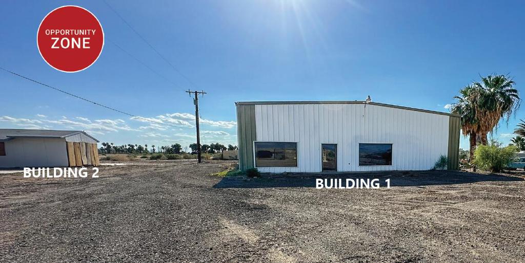 ■ +/- 5,000 SF Warehouse Building Plus +/-1,544 SF Home On 15.47 AC■ Prime Location With Easy Access To I-10 & US 95 (Intake Blvd.)■ Service Industrial Zoning-Allows For Wide Range Of Uses■ Ideal Location For Automotive Repair, Contractor's Yard, or Storage & Warehousing Operations■ 2 Miles to California/Arizona Border■ Priced To Sell