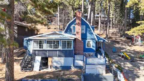 Photo of 31734 Hilltop Boulevard, Running Springs, CA 92382 (MLS # DW26202151)
