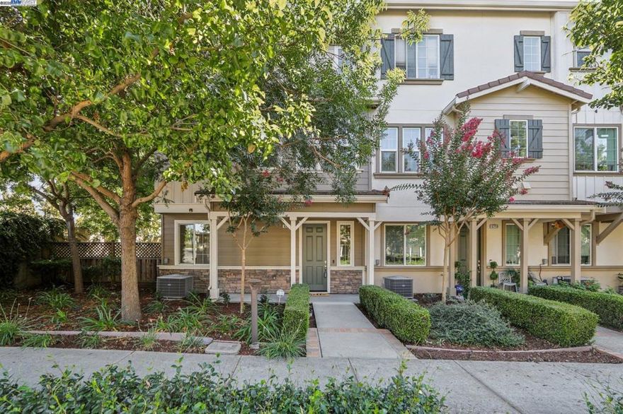 A unique highlight of this home is its expansive side yard. Rarely available townhome in the sought-after Emerald Vista community! Offering over 2,000 sq. ft. of living space, this bright and spacious residence. Versatile first-floor bedroom with full bathroom. The open-concept floor plan is filled with natural light and highlights hardwood flooring, designer shutters and blinds, pre-wired surround sound, and a cozy fireplace in the living area. The gourmet kitchen boasts granite countertops, ample cabinetry, and modern finishes—perfect for everyday living and entertaining. A rare find in the community, ideal for gatherings, gardening, or outdoor relaxation. Located within walking distance to BART, Don Biddle Park and minutes from shopping, dining, and major freeways (I-580/I-680) The home also offers convenient access to Iron Horse and Alamo Creek trails right from within the neighborhood. Kaiser medical facility nearby adds even more value to this exceptional location. A stylish blend of comfort and convenience—don’t miss this rare opportunity in Dublin!