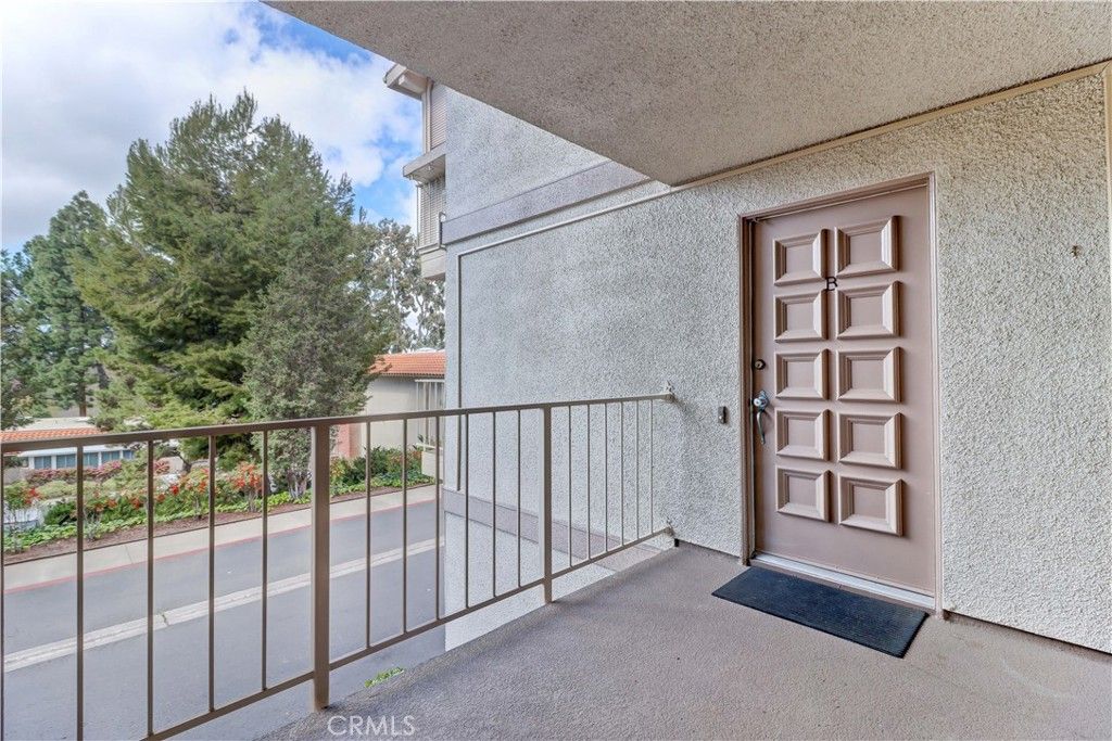 Photo of 661 Avenida Sevilla #B, Laguna Woods, CA 92637 (MLS # OC26070123)